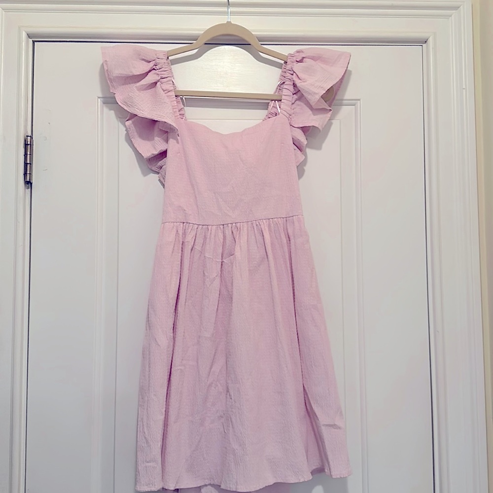 Francesca’s New lavender ruffle dress with open back and bow size small